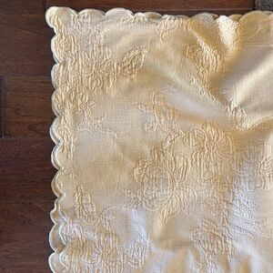 132” x 56” light gold matelasse tablecloth and napkins.